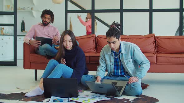 Multiethnic Startup Team Creating Business Project alt