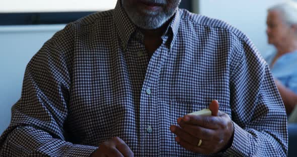 Seniors playing dominoes 4k alt