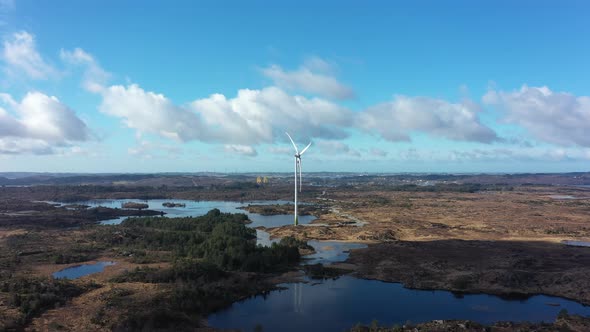 Two enercon wind turbines in Gismarvik Norway during beautiful sunny day - Aerial panoramic view sho alt