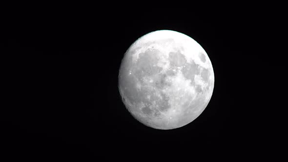 Full Moon and Clouds alt