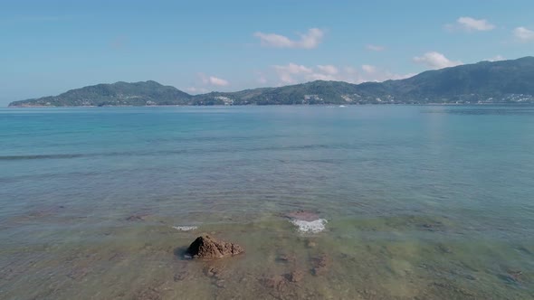 Aerial shot fly over tropical ocean at daytime Beautiful sea in summer season alt