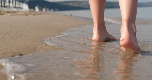 Child Foot in the Sea Water alt