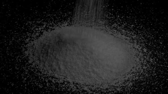 Grey Granules Pour Into Pile alt