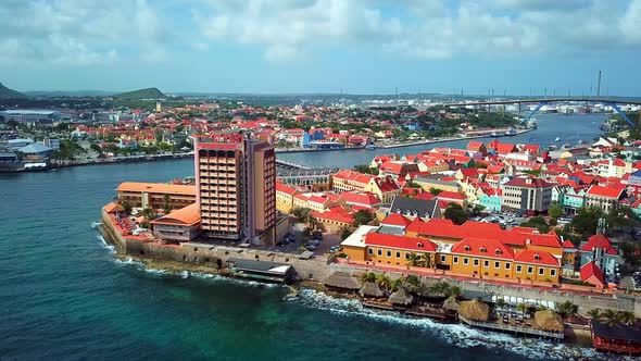Aerial view truck left of the Punda district of Willemstad, Curacao with Otrobanda and the Oil Refin alt