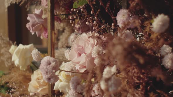Closeup View of Wedding Floral Decorations of Flowers in Pastel Faded Colors Slow Motion Outside alt