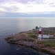 Lighthouse on the cliff aerial view at dusk in England - VideoHive Item for Sale