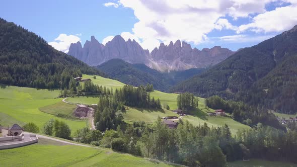 Aerial travel drone view of South Tyrol, Italy and the Dolomites mountains. alt