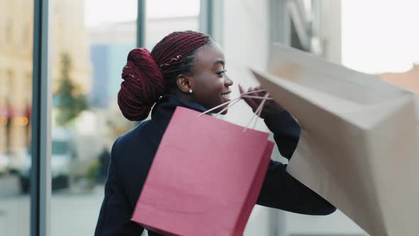 Back View Happy Beautiful Stylish Fashionable African American Woman Girl Consumer Lady Walking in alt