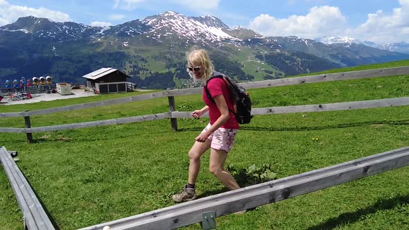 Woman Playing Marble Run Game alt