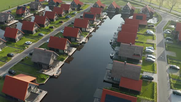 Luxurious Holiday Resort And Polder With Boats On Jetty At Waterstaete Ossenzijl In Netherlands. - a alt