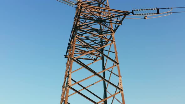 Transmission tower supporting an overhead high voltage power line - close up