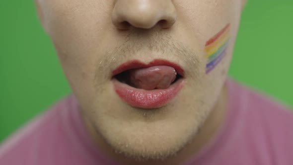 Bearded Man with Painted Lips Licks Them Sexually. LGBT Community. Transsexual alt