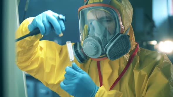 Covid-19 Vaccine Testing Concept, Antibodies Research. A Person Uses Laboratory Tools While Working alt