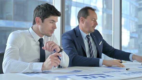 Business People Working on Documents alt