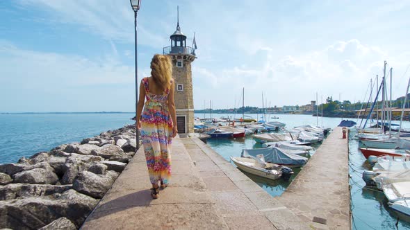 Girl Goes To a Lighthouse alt