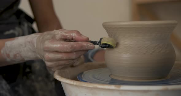Close Up of Pottery Artist at Work Potter Master Creating Clay Pot on a Wheel