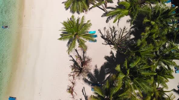 Cook Island - Flying over white sand beach in Rarotonga Island. Drone footage alt