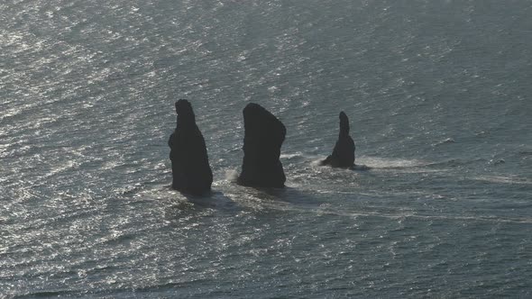 Silhouette of Rocky Mountain Peak Islands in Pacific Ocean