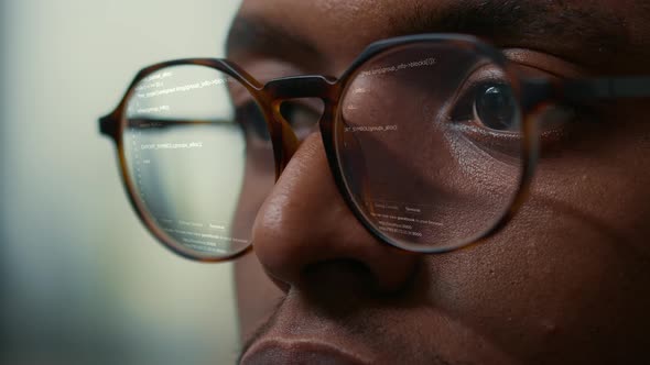 Vfx of Running Programming Code Reflected in Software Developer Glasses alt
