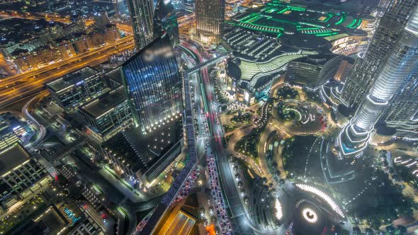 Dubai Downtown Street with Busy Traffic and Skyscrapers Around Timelapse alt