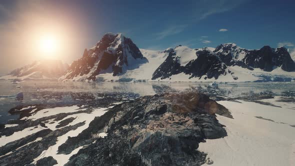 Sunset Mounts, Ocean. Antarctica Lemaire Channel. alt