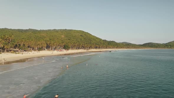 Timelapse of People Rest at Sand Beach Swim at Ocean Bay Aerial