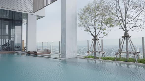 Panning Through A Luxury Hotel With Rooftop Infinity Pool In Bangkok Thailand alt