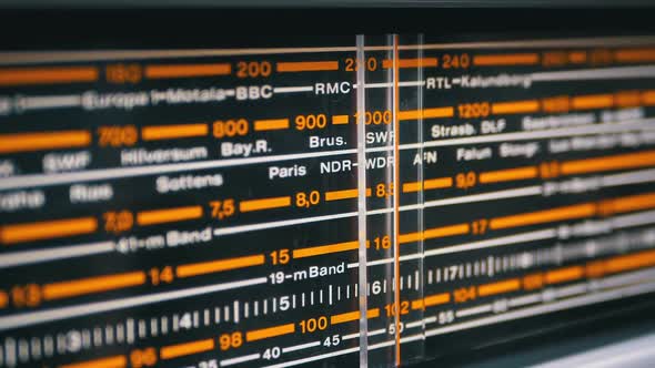 Tuning Analog Radio Dial Frequency on Scale of the Vintage Receiver alt