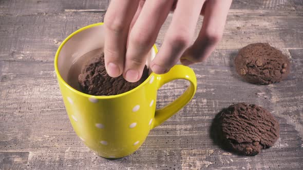 Slow Motion the Boy Dips Cookies in Cocoa