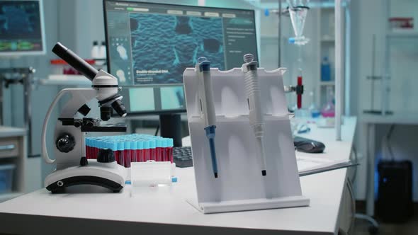 Close Up of Scientific Micropipette and Instruments alt