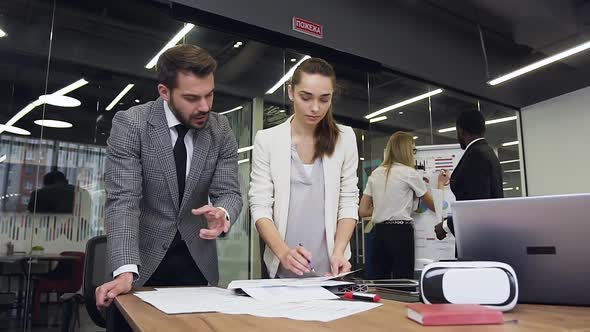 Modern Mixed Race Business People which Working Together Under Business Project  alt