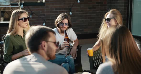 Friends Relaxing and Drinking Beer