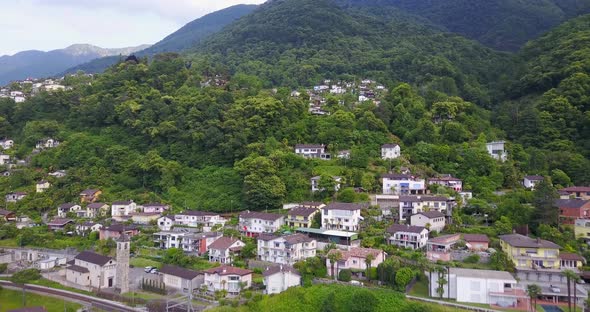 Aerial drone view of a town village on Lake Maggiore, Switzerland alt