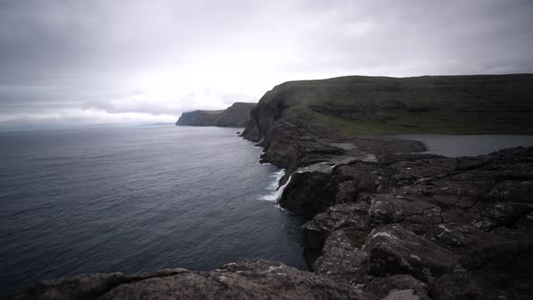Bosdalafossur Waterfall and Coastline Sliding Camera in Faroe Islands