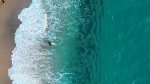 Fisherman Catches Fish in a Net From the Seashore Aerial View 4 K alt
