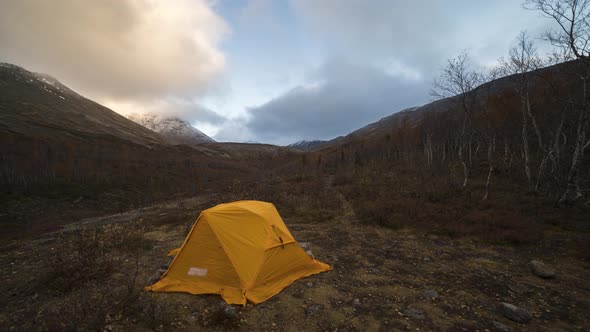 Tent and Clouds in Autumn Morning in Khibiny Mountains alt