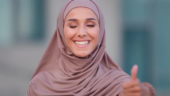 Closeup Muslim Happy Satisfied Contented Woman Wearing Hijab on Head Looking at Camera Smiling alt