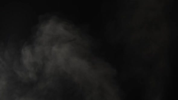 Steam or smoke over black background alt