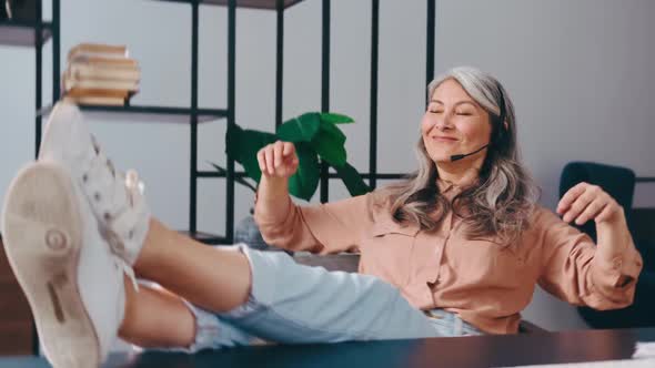 Woman in the Office at the Workplace Happy Resting alt