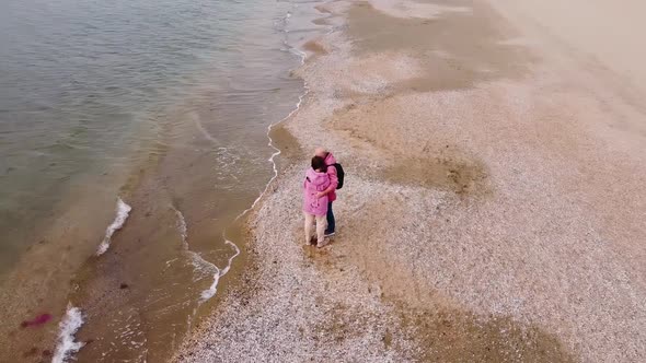 A Couple of Lovers on the Beach on Vacation