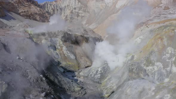 Aerial Drone Footage of Mutnovsky Volcano Crater with Fumaroles and Glacier