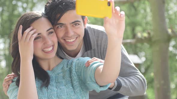 MS Couple taking self portrait with mobile phone / Breda, NoordBrabant, Netherlands