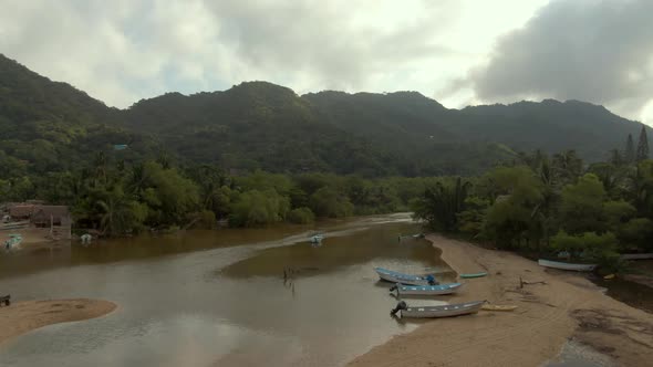 Nature Landscape At Yelapa River In Jalisco, Mexico On A Cloudy Day - aerial drone shot alt