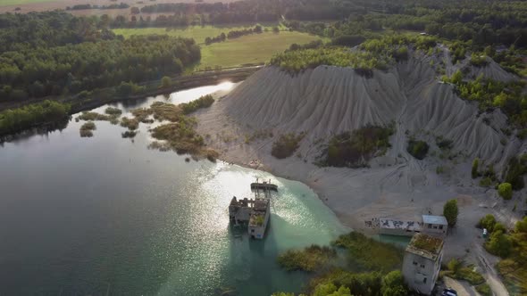 Sand Hills of Quarry With a Pond and Abandoned Prison in Rummu Estonia Europe. Aerial Dron Shoot. alt