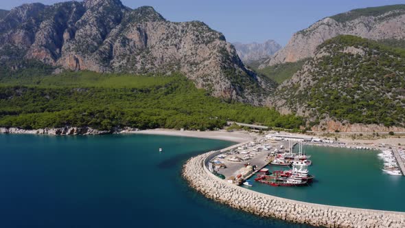 Landscape with Beautiful Sea Lagoon Harbor and Green Mountains in the Background alt