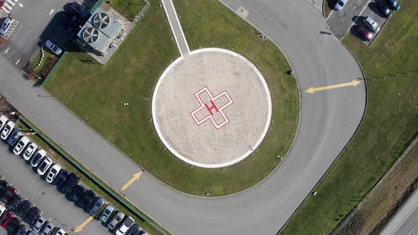 Top Down View of a Helicopter Landing Pad, Slow Drone Moving Forward alt
