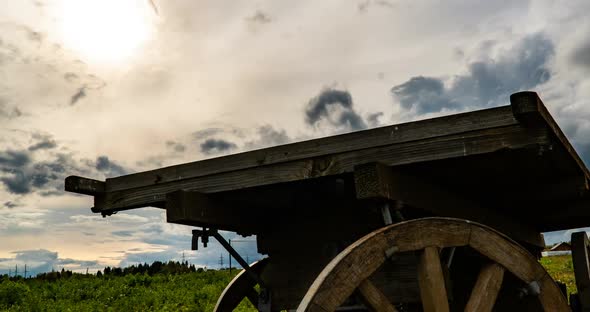 Antique Wooden Cart Standing Alone in a Field Beautiful Autumn Landscape Hyperlapse Time Lapse Heavy alt