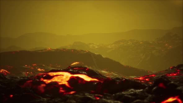 Black Lava Field with Hot Red Orangelavaflow at Sunset alt