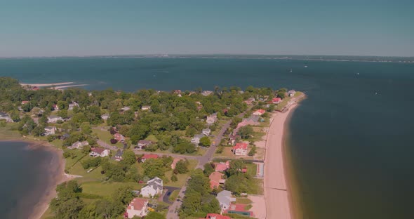 Aerial of Waterfront Houses and Beach Shore in Long Island on a Sunny Day alt