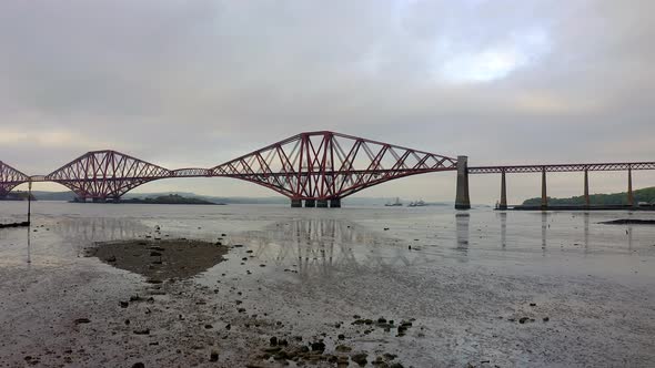 A Railway Bridge Crossing the Forth of Firth in Scotland alt
